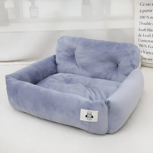 Grey and blue plaid cloth dog travel nest for car use, shown in two sizes.