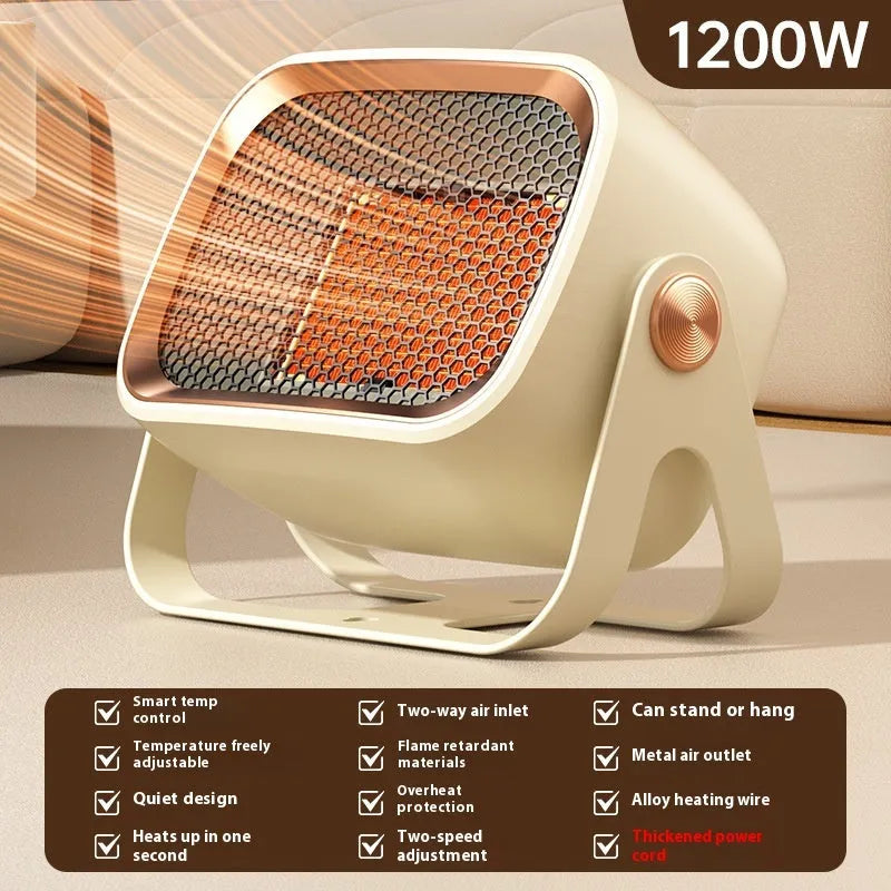 Compact white PTC ceramic desktop heater with rotatable body on a wooden desk.