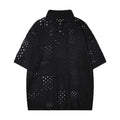 Solid black loose-fit knitted short-sleeved polo shirt for teenagers on a hanger.