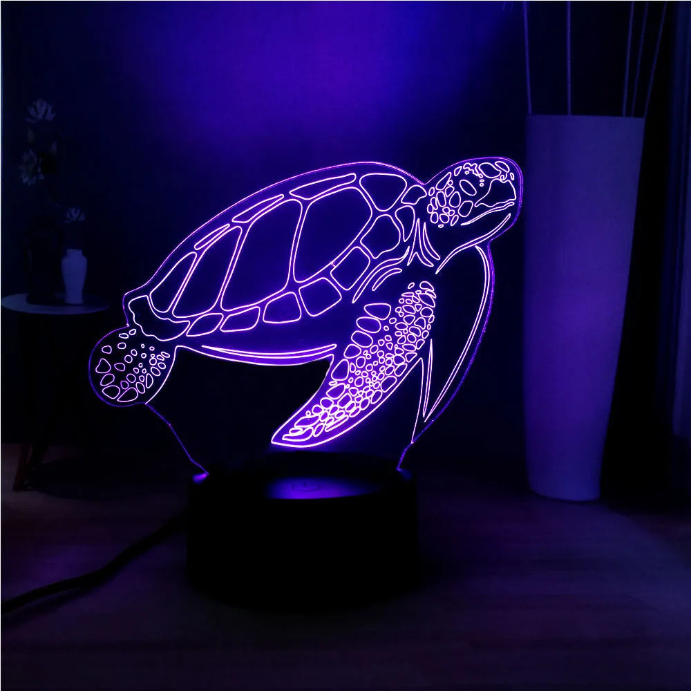 3D clear acrylic turtle-shaped LED night light showing multiple colour options.