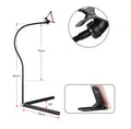 Black and white universal mobile phone holder shown as a bedside bracket and an under-bed floor stand.