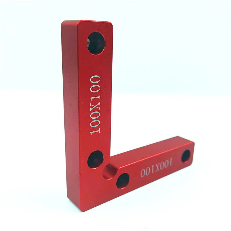 Aluminium right angle positioning block for woodworking jigsaw, showing scale and 90-degree clamp.
