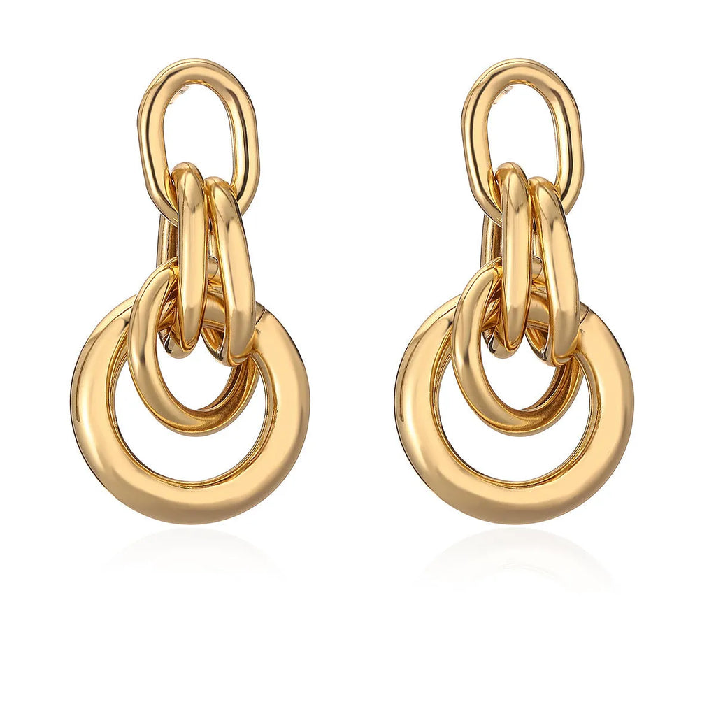 Gold geometric copper earrings with irregular shape and simple pierced design