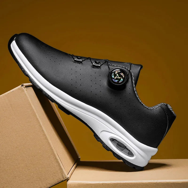 Black and white low-top mesh casual tennis shoes with lace-up front and cross shoulder straps