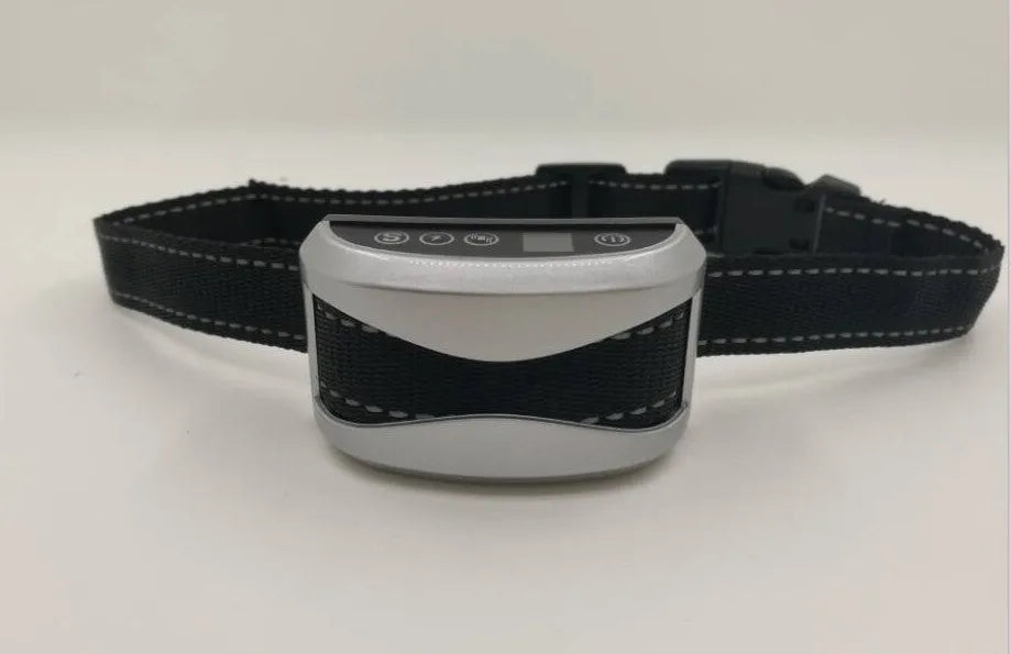 Electronic anti-bark dog training collar with digital display on a black adjustable reflective strap.