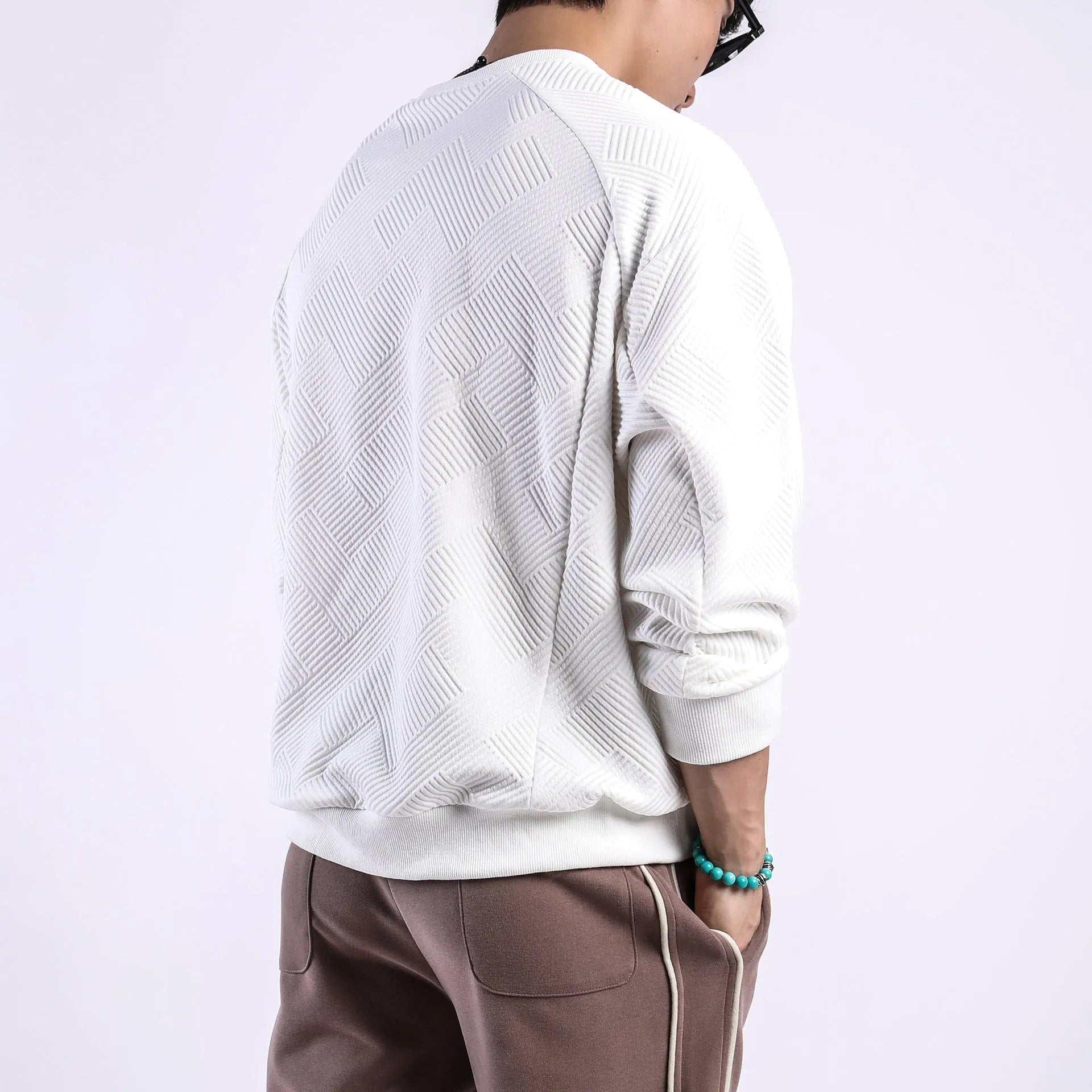 Men's loose fit twill jacquard pullover sweater in Army Green colour showing round neck and long sleeves