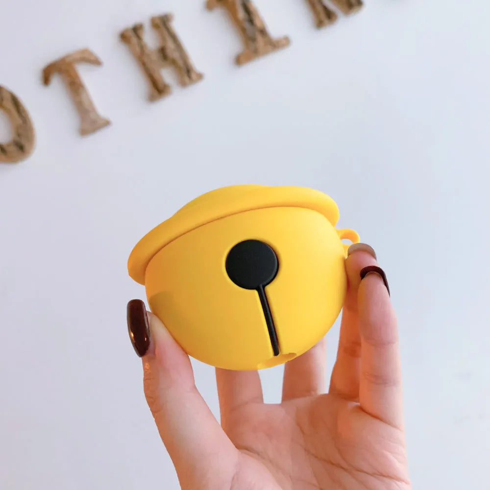 Yellow silicone AirPods case with small bell accessory attached for AirPods 1 and 2