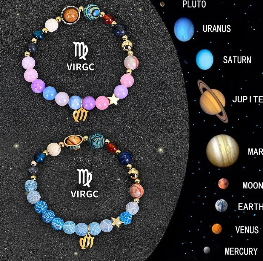 Two natural stone beaded bracelets with metal zodiac charm pendants on a flat surface.