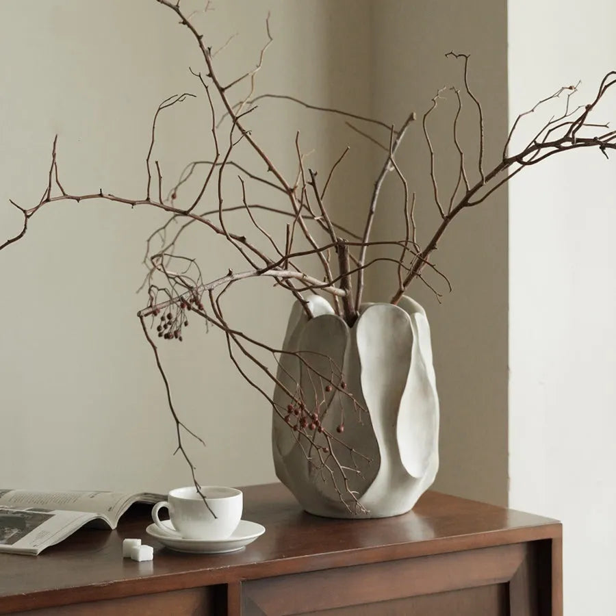 Irregular shaped ceramic vase in magnesium clay for flower arrangements