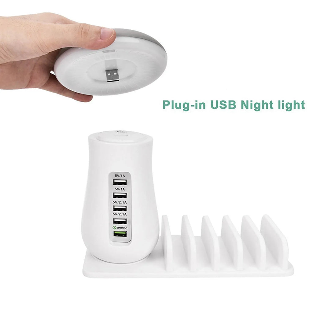 White mushroom-shaped USB charging dock with 5 ports and built-in LED night light on a desk