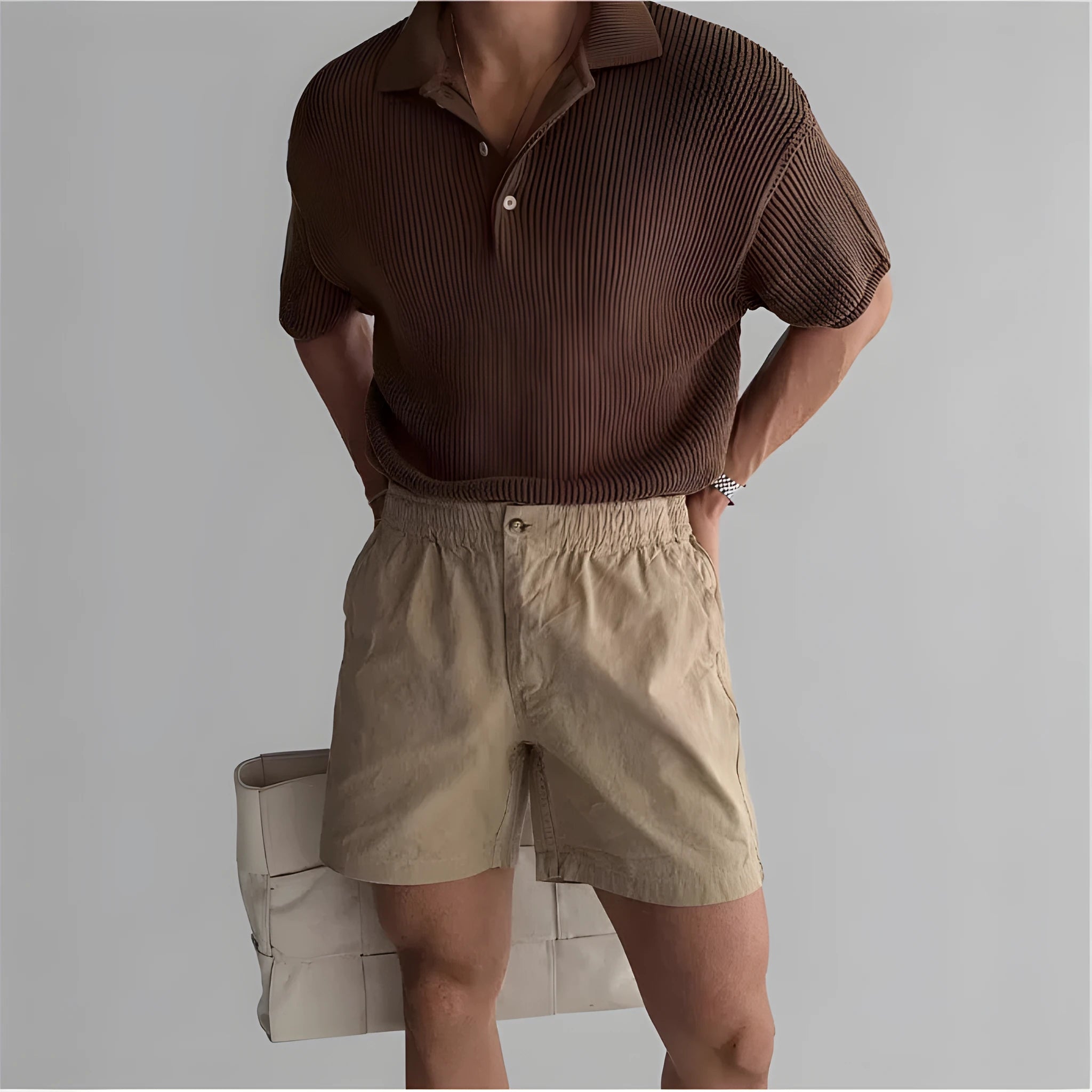 Men's loose-fit cotton sports shorts in black, shown on a white background