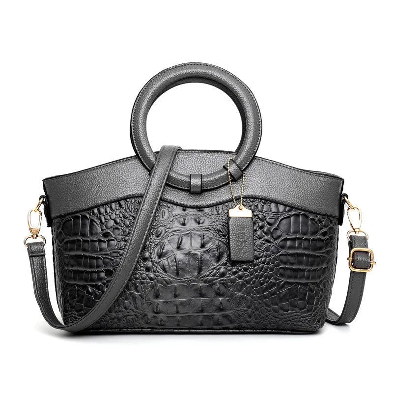 Fabric ladies handbag in multiple colours showing zipper compartment and internal organisation pockets