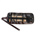 27-piece pottery tool set with roller, featuring wood, stainless steel, and plastic sculpting tools on a table.