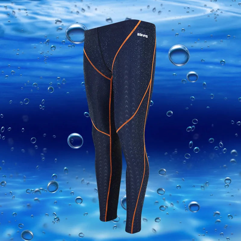 Men's black nylon cropped swimming trunks with a coloured line detail and brief style