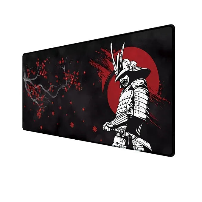 Japanese Samurai design cloth gaming mouse pad with non-slip base on a desk.