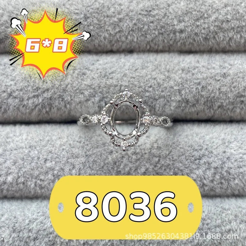 Copper oval denier ring with a 6x8 mm five-pointed star and open mouth setting.
