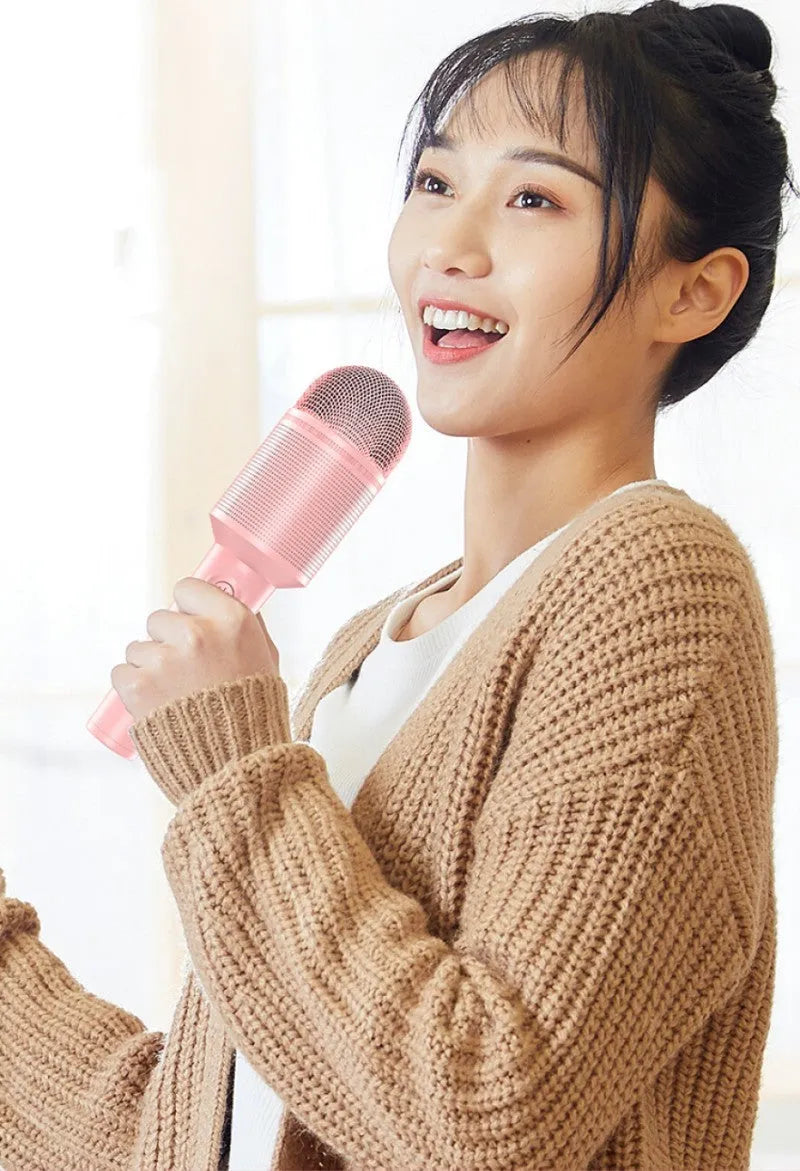 Bluetooth karaoke microphone in pink, blue and green colour options with USB connectivity