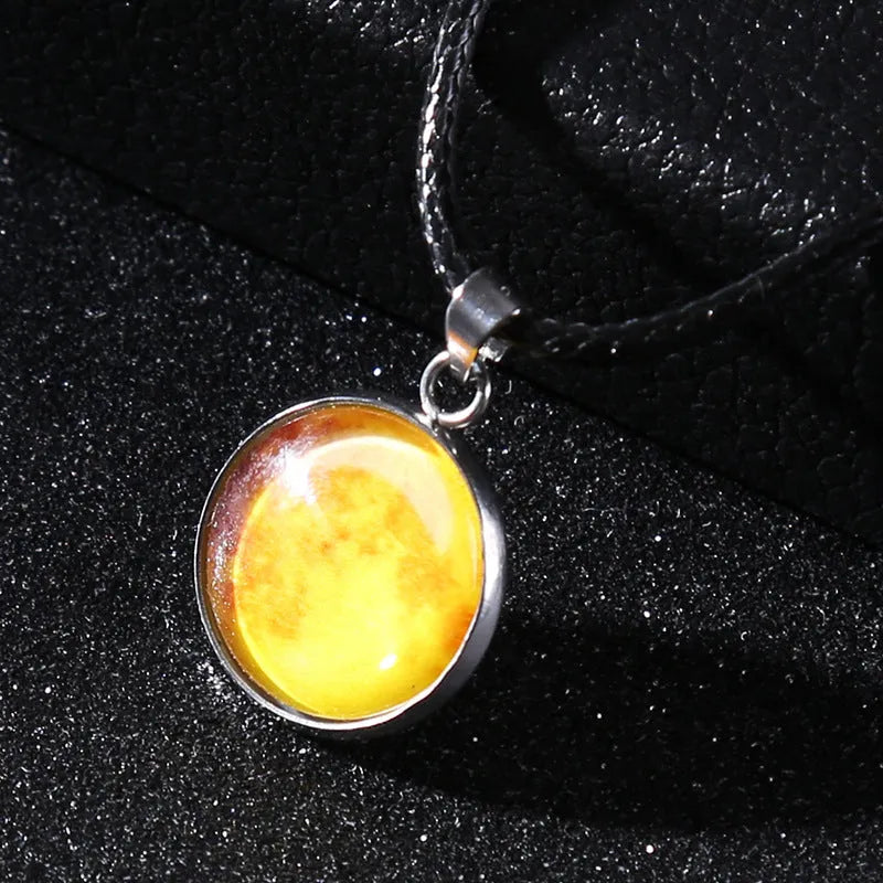 Luminous alloy unisex necklace with organic glass constellation pendant on adjustable glass chain.