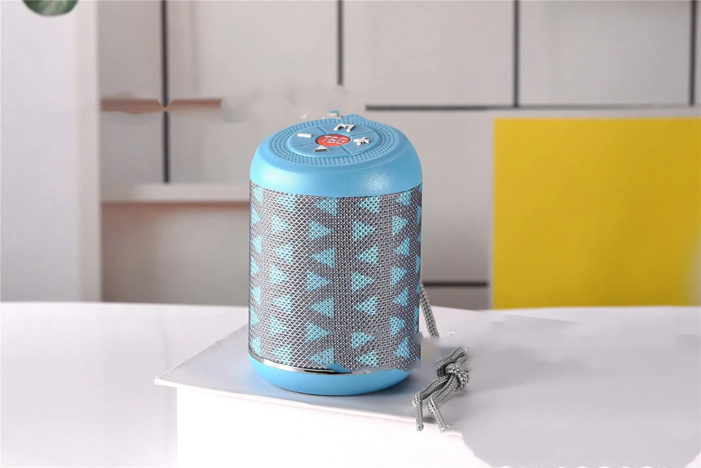 Portable outdoor Bluetooth subwoofer speaker in multiple colour options including black, blue, and camouflage.