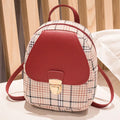 Diagonal shoulder phone bag in PU material showing adjustable strap and handheld carry option