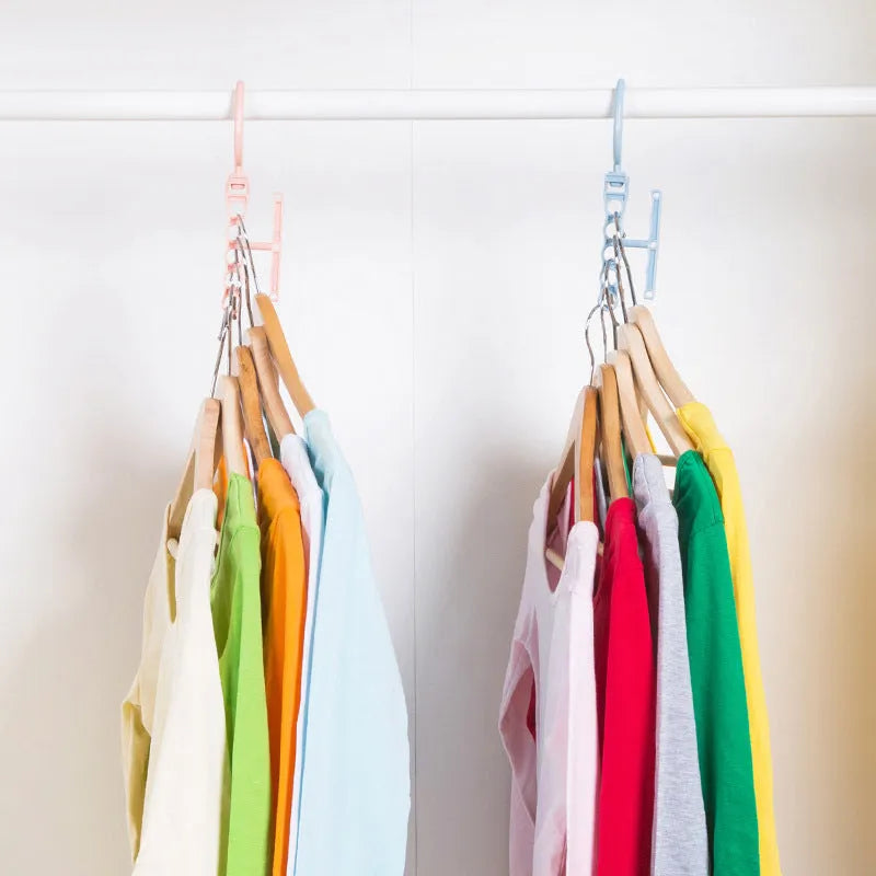 Blue revolving wardrobe hanger with five branches and folding handle for clothing organisation