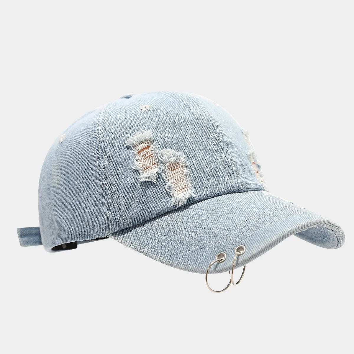 Men's adjustable denim peaked cap in black, white and light blue jeans colours with dome crown