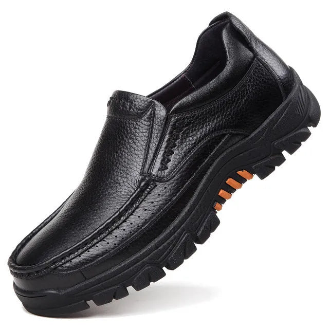 Men's black cowhide leather slip-on business casual shoes with a rubber sole.
