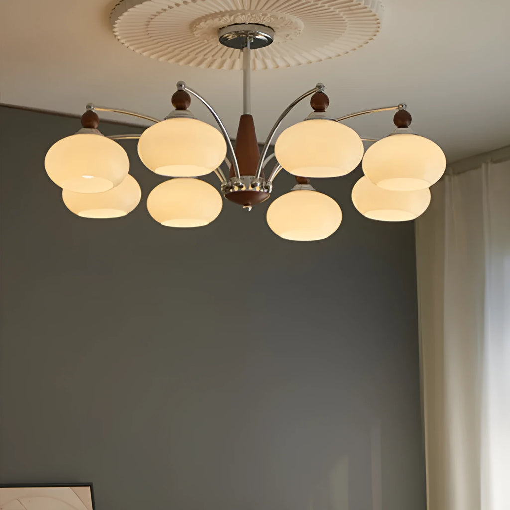 Persimmon glass and chrome chandelier with multiple lampshades in a Middle Ancient style