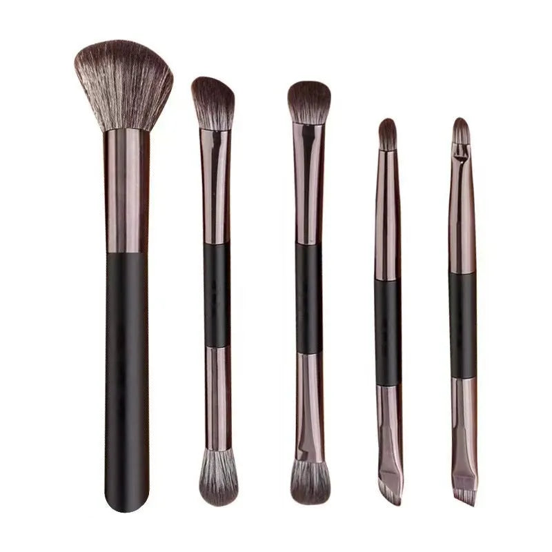 Portable makeup brush set with mirror showing eyeshadow brushes with artificial fibre bristles