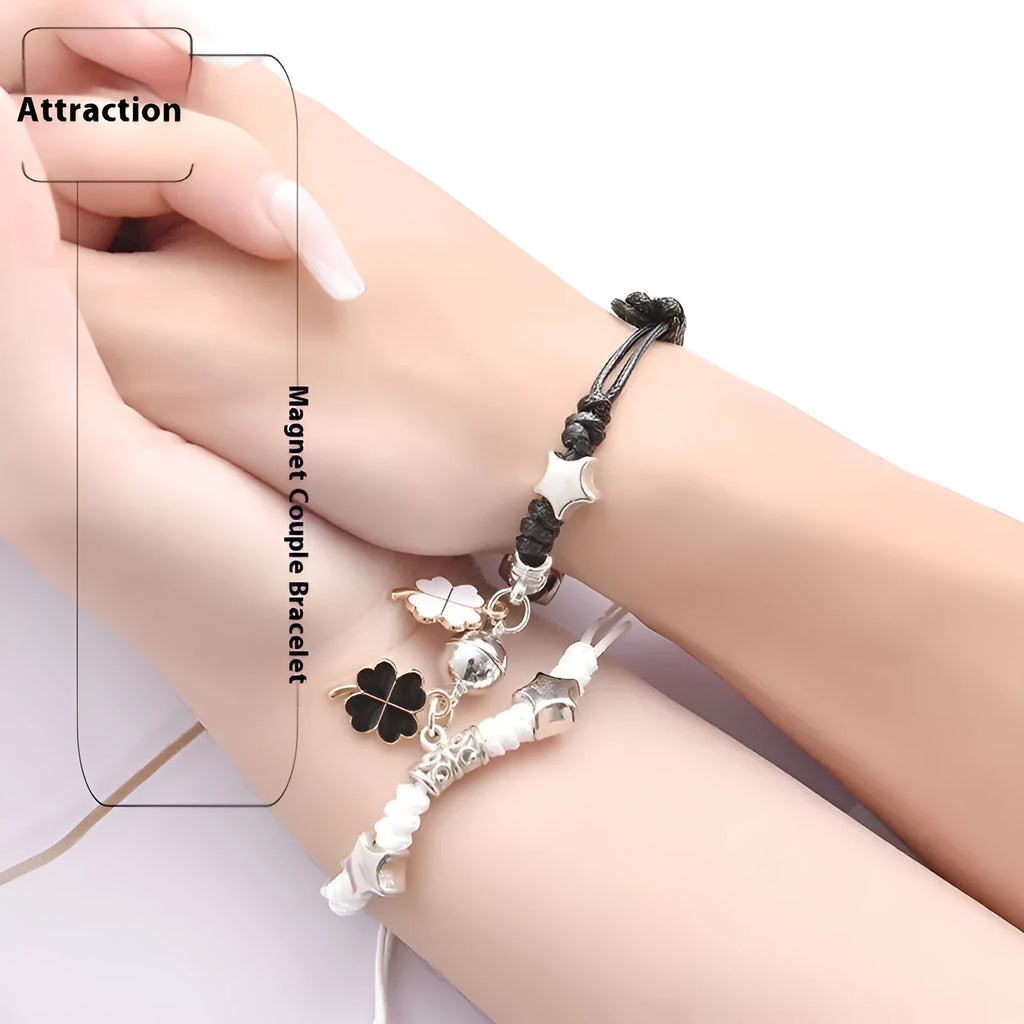 Pair of alloy suction bracelets with engraved symbol choices including crown, love lock, and clover.