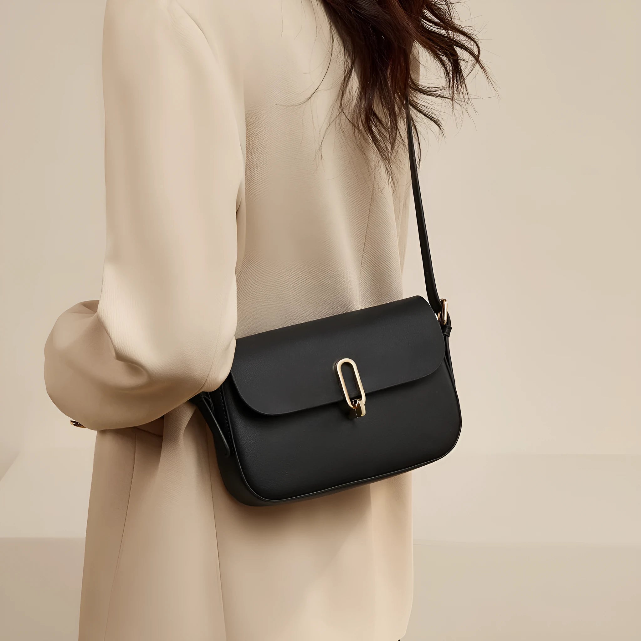 Two-layer cowhide genuine leather square shoulder messenger bag in black with lock detail and zipper change pocket