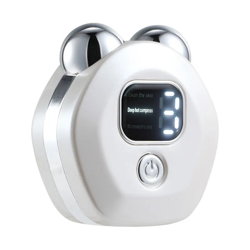 Portable white facial massage instrument with double-roller head for hot compress and microcurrent treatment.