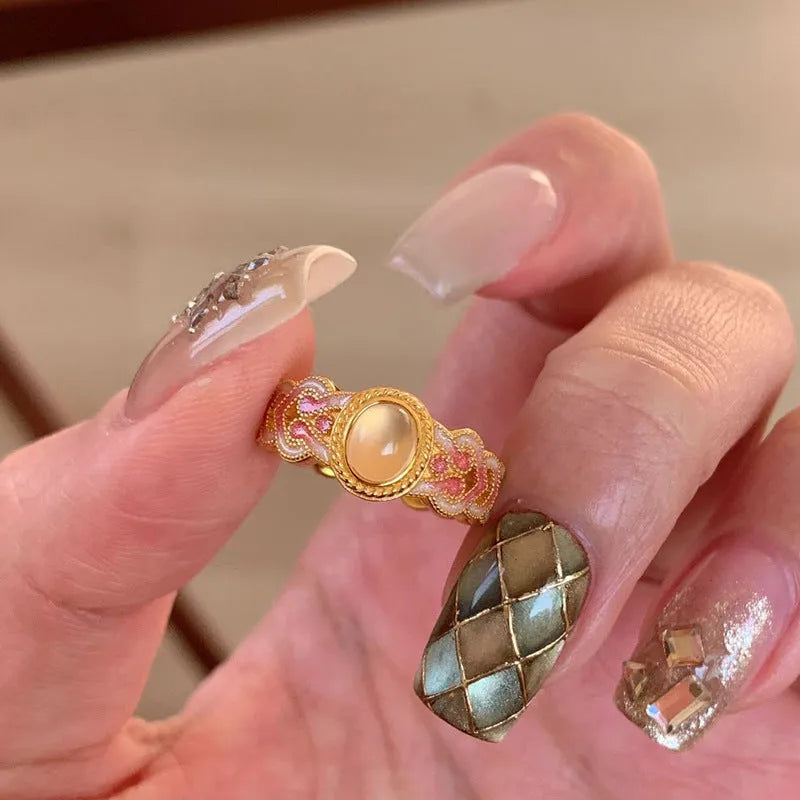 Pink crystal enamel open ring with geometric shape and gold plating on copper