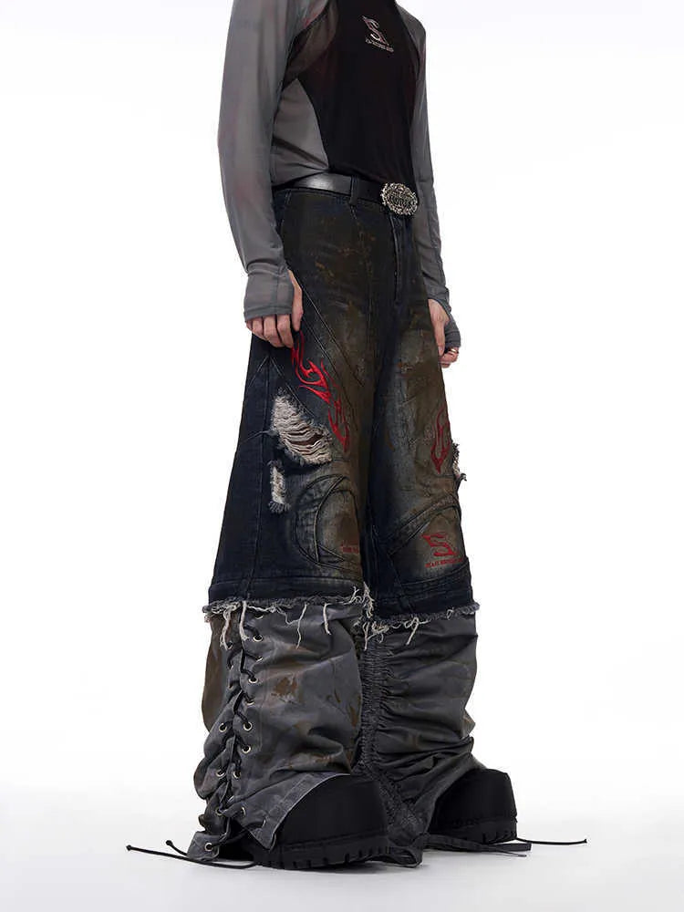Men's wide-leg retro denim jeans with detachable trouser legs in a loose fit with a mid-high waist.