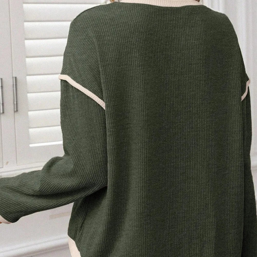 Women's loose knit top with four leaf clover pattern, drop shoulders and contrast colour trim