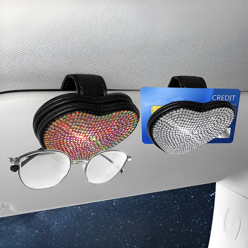 Black diamond-encrusted PU leather magnetic storage clip for car sun visor, holding sunglasses.