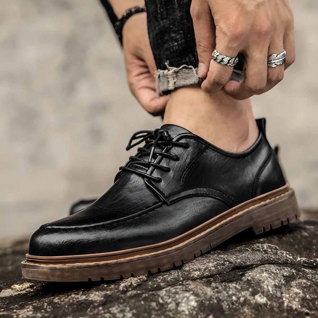Men's brown casual leather slip-on shoes with round toe and flat rubber sole