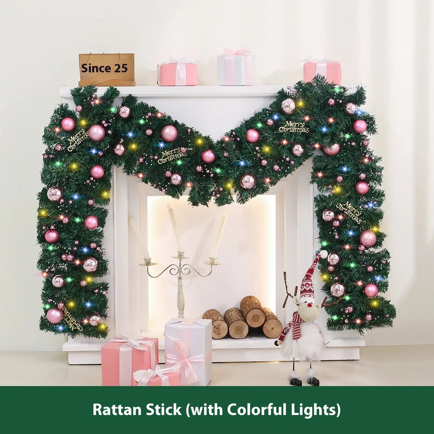 2.7 metre pink small fruit Christmas rattan garland with wrought iron frame draped along wall