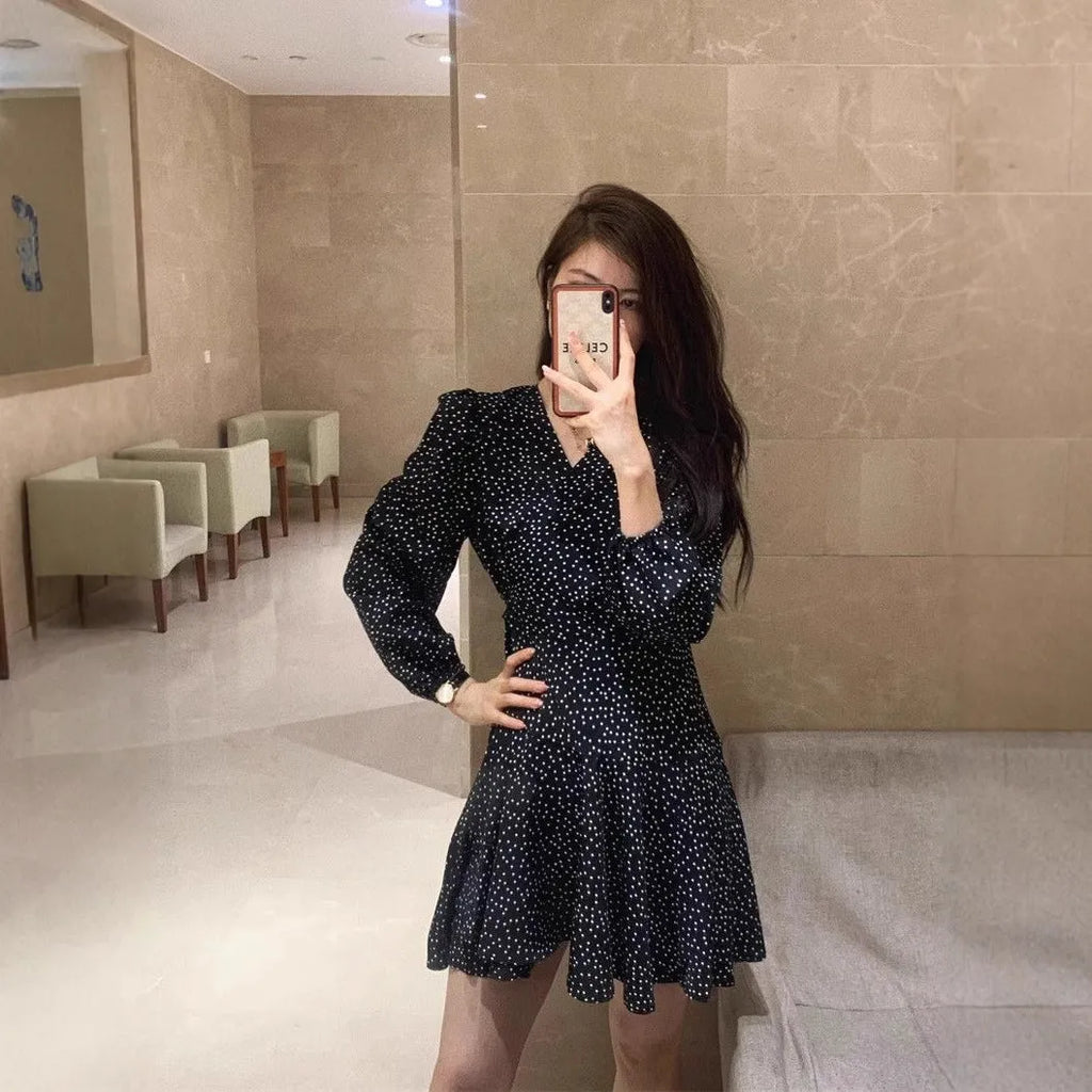 Women's black polka dot high waist midi dress with long sleeves in pullover style polyester fabric