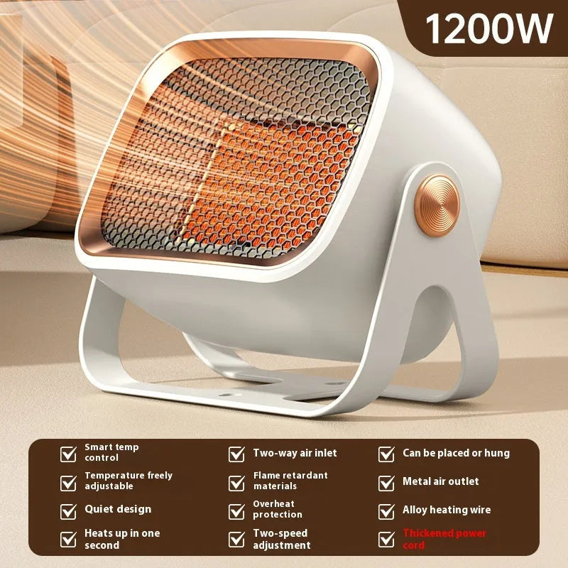 Compact white PTC ceramic desktop heater with rotatable body on a wooden desk.
