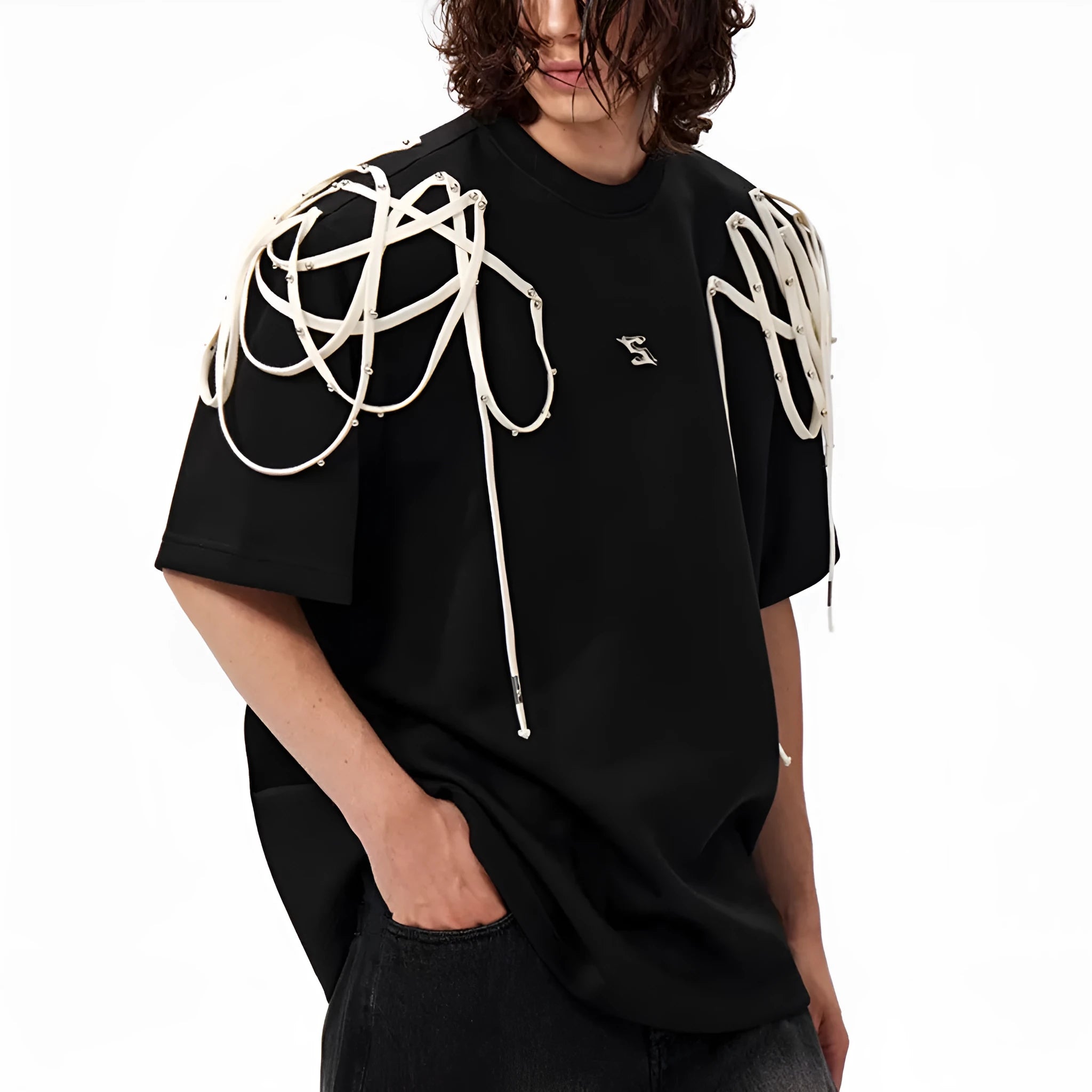 Black loose fit T-shirt with padded shoulders and decorative rivet ribbon detail on a short sleeve.
