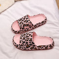Women's leopard print EVA slippers with a thick sole on a plain background.