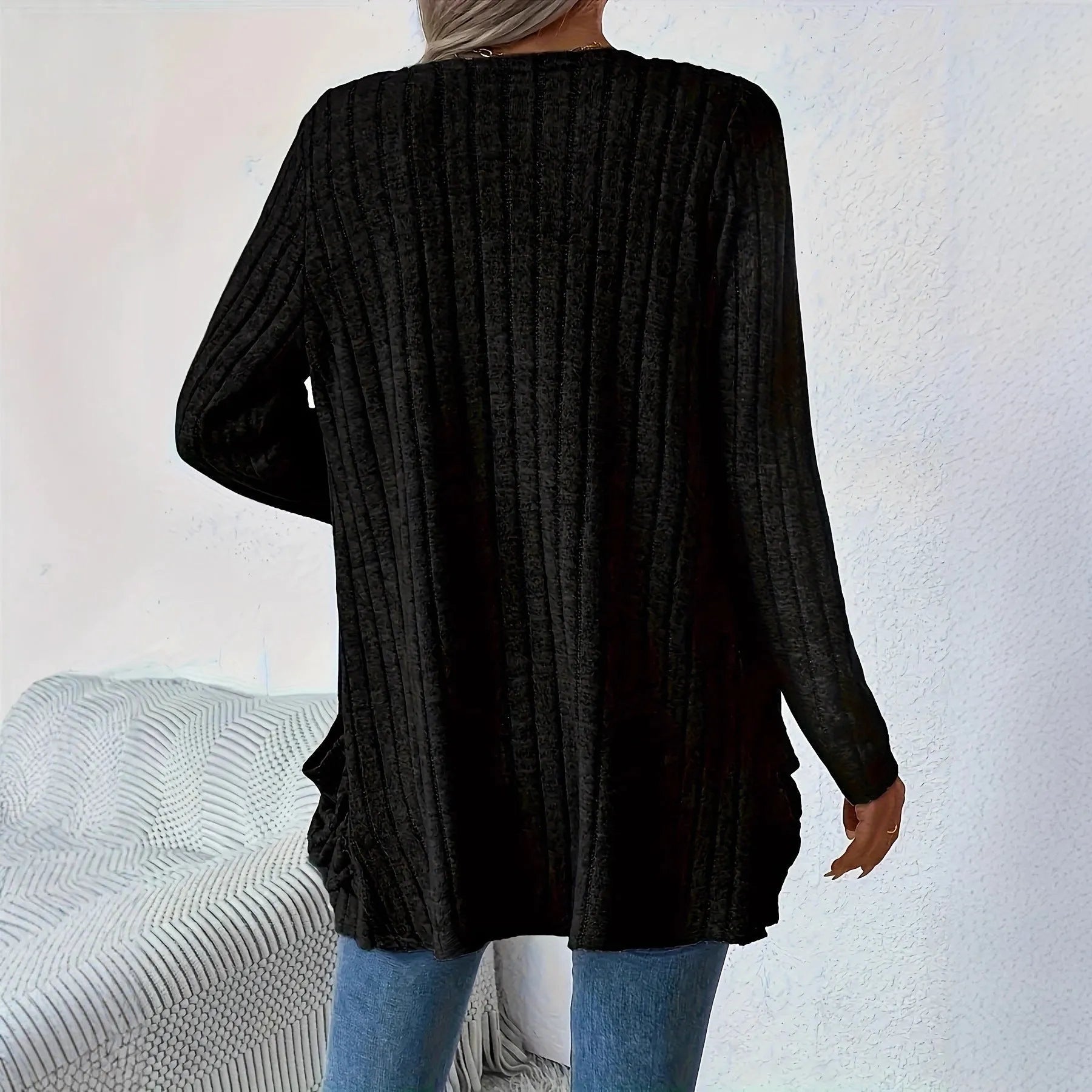 A loose-fit, solid colour long sleeve cardigan for women with a chest pocket, shown in grey and black.