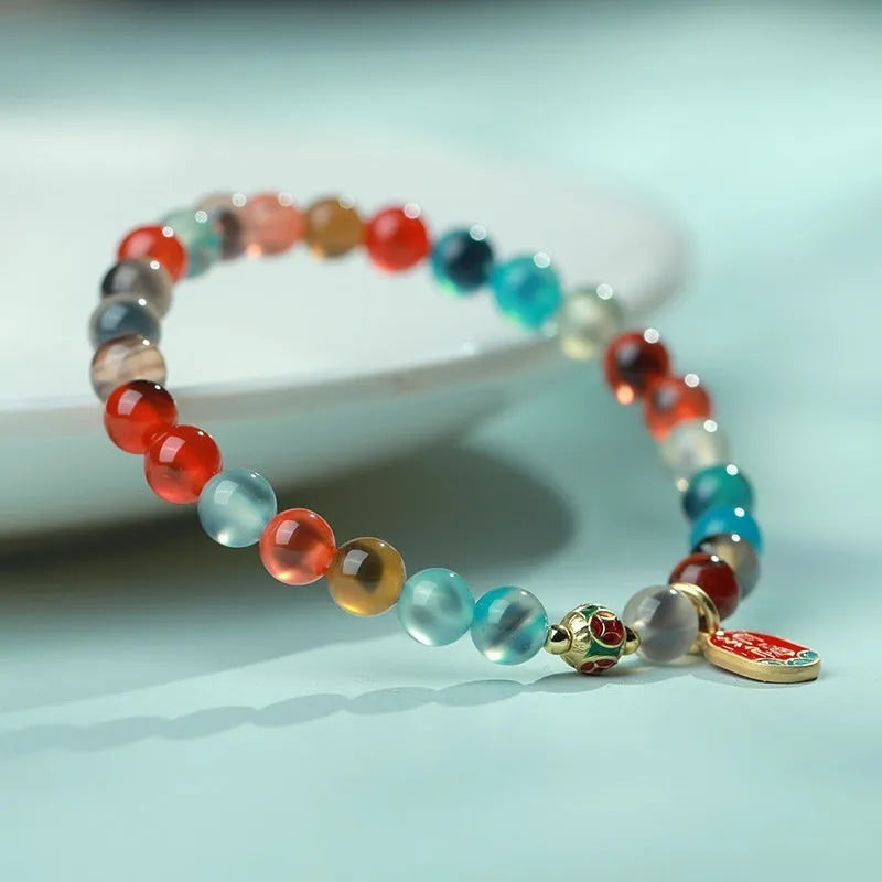 Natural agate women's bracelet with colourful sugar heart designs and geometric snake chain closure