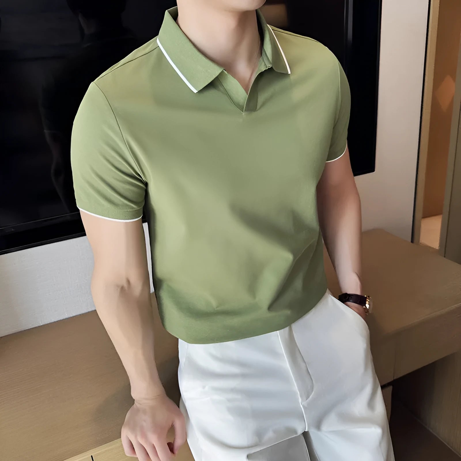 Men's solid colour short sleeve polo shirt in a cotton blend, shown in apricot colour.