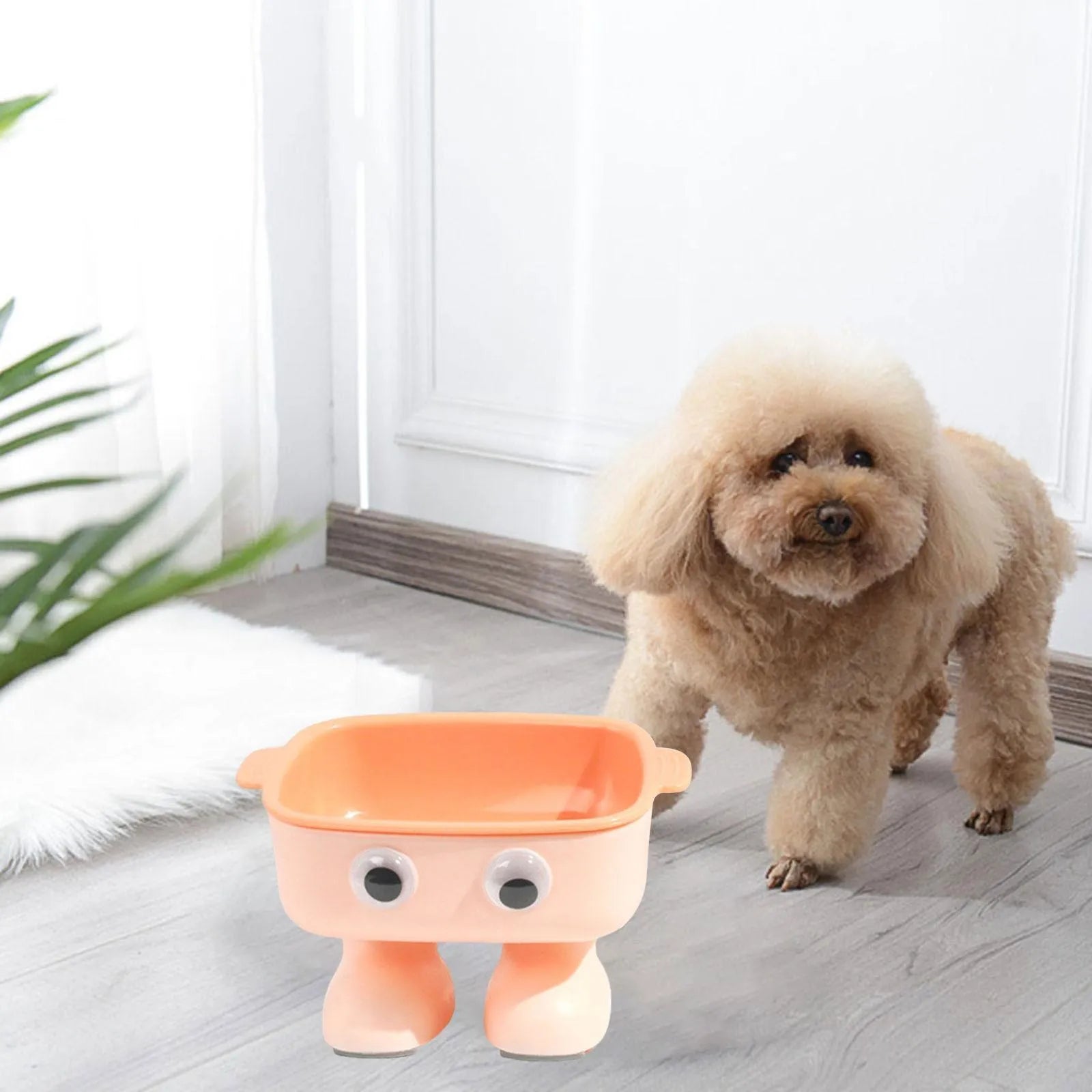 Elevated robot-shaped cat bowl with tilted design and detachable inner bowl in green colour