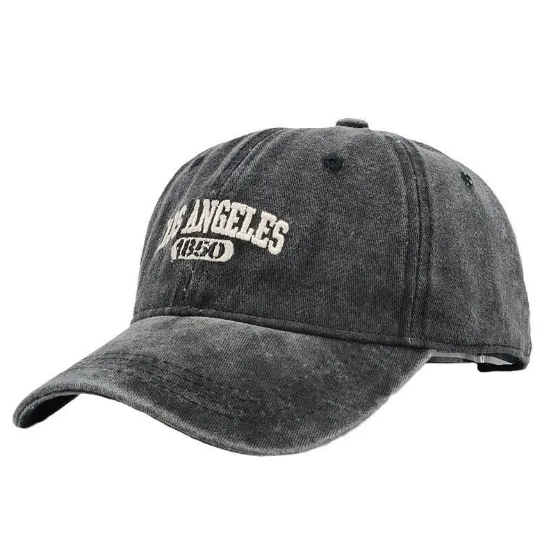 Retro personalised embroidered peaked cap in acrylic fabric with adjustable fit and distressed lettering