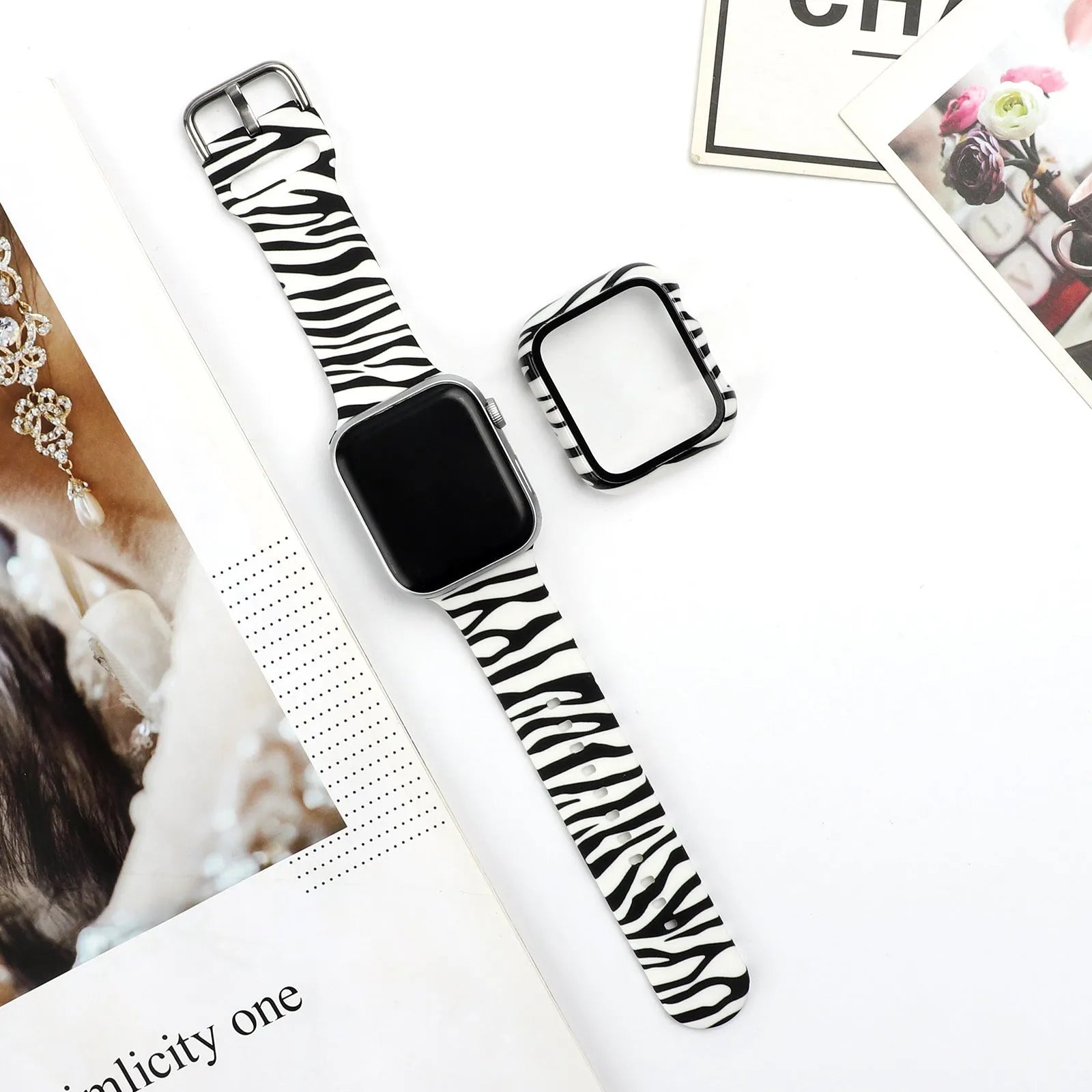 Printed silicone watch strap for Apple Watch showing multiple colourful pattern options.