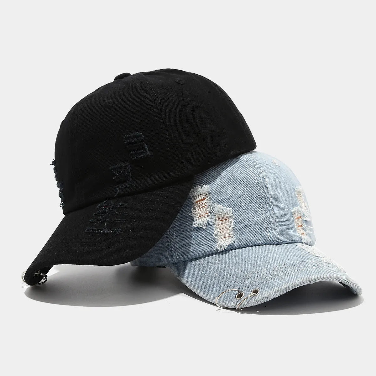 Men's adjustable denim peaked cap in black, white and light blue jeans colours with dome crown
