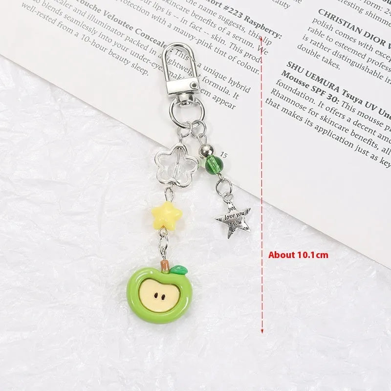 Plastic resin mobile phone charm keychain with fruit patterns including apple and strawberry designs